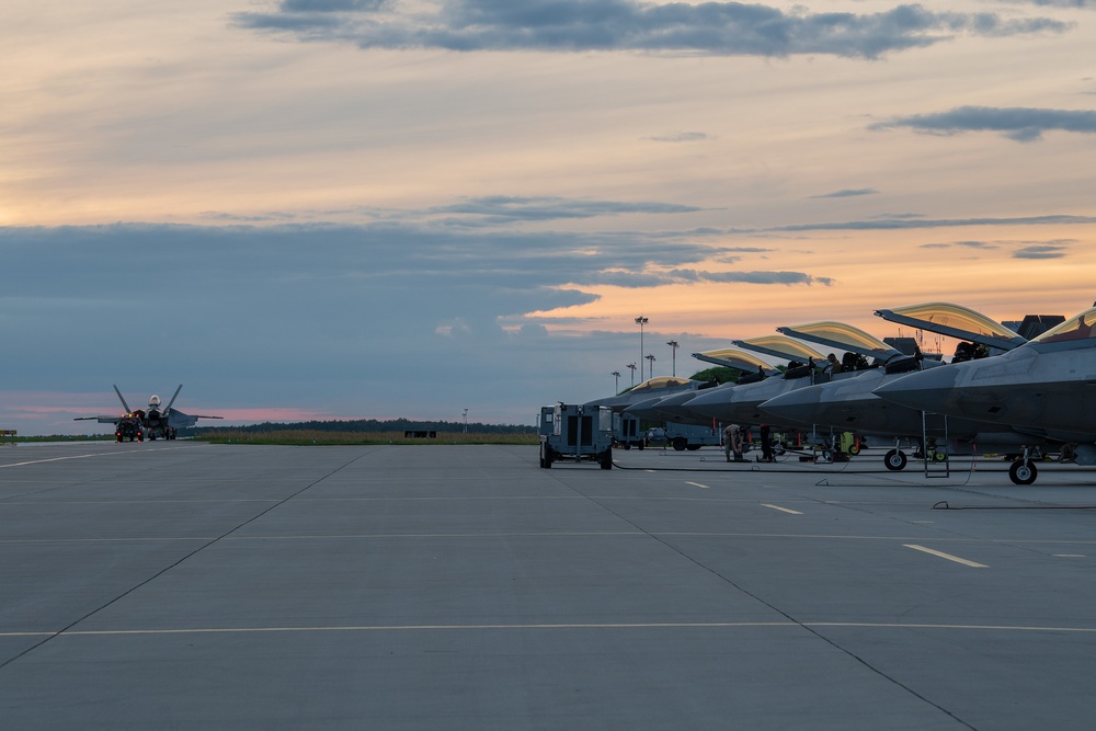 90th AMXS tow F-22 for maintenance