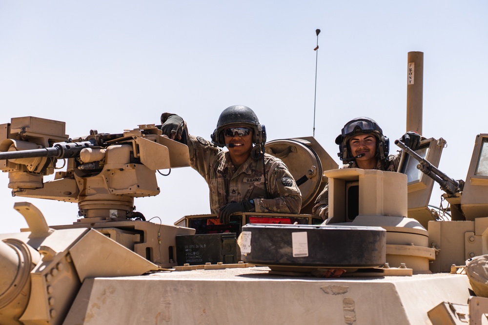 Soldiers prepare to move during Exercise Eager Lion