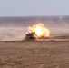 M1 Abrams Tank fires a round down range