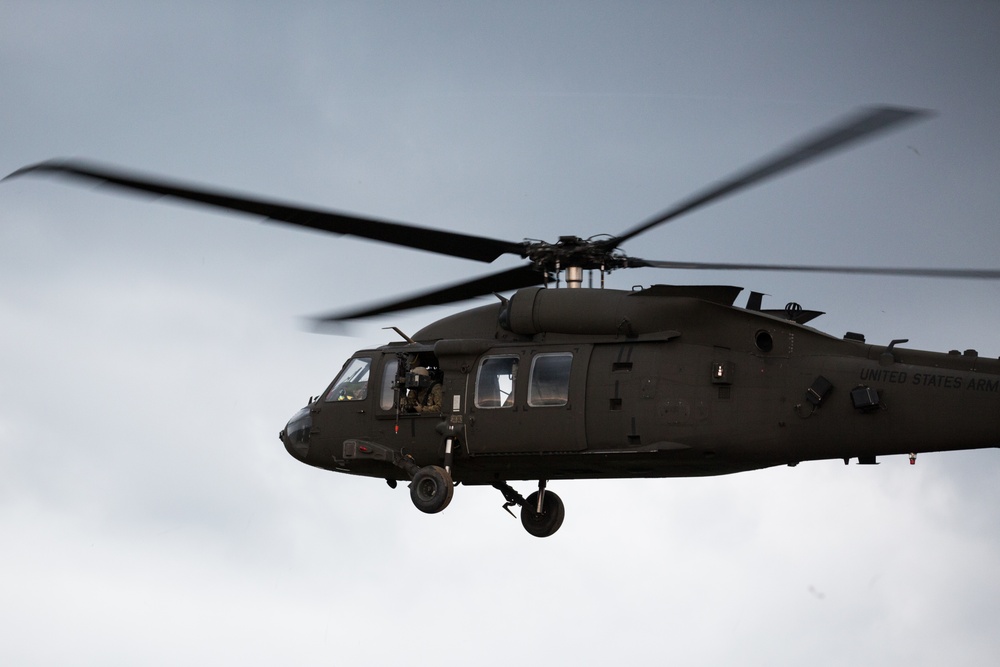 UH-60 comes in for landing during cold load training