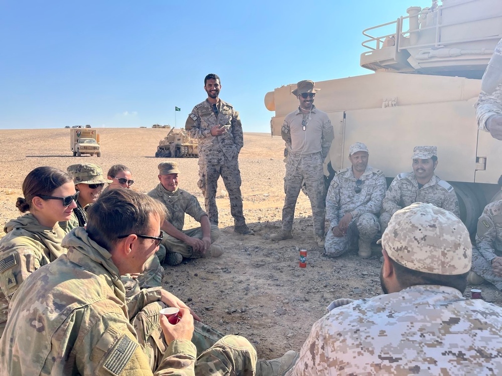 Saudi and U.S. soldiers share tea and drinks