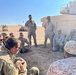 Saudi and U.S. soldiers share tea and drinks