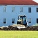 Final exterior grading takes place at fiscal year 2020-funded barracks project at Fort McCoy