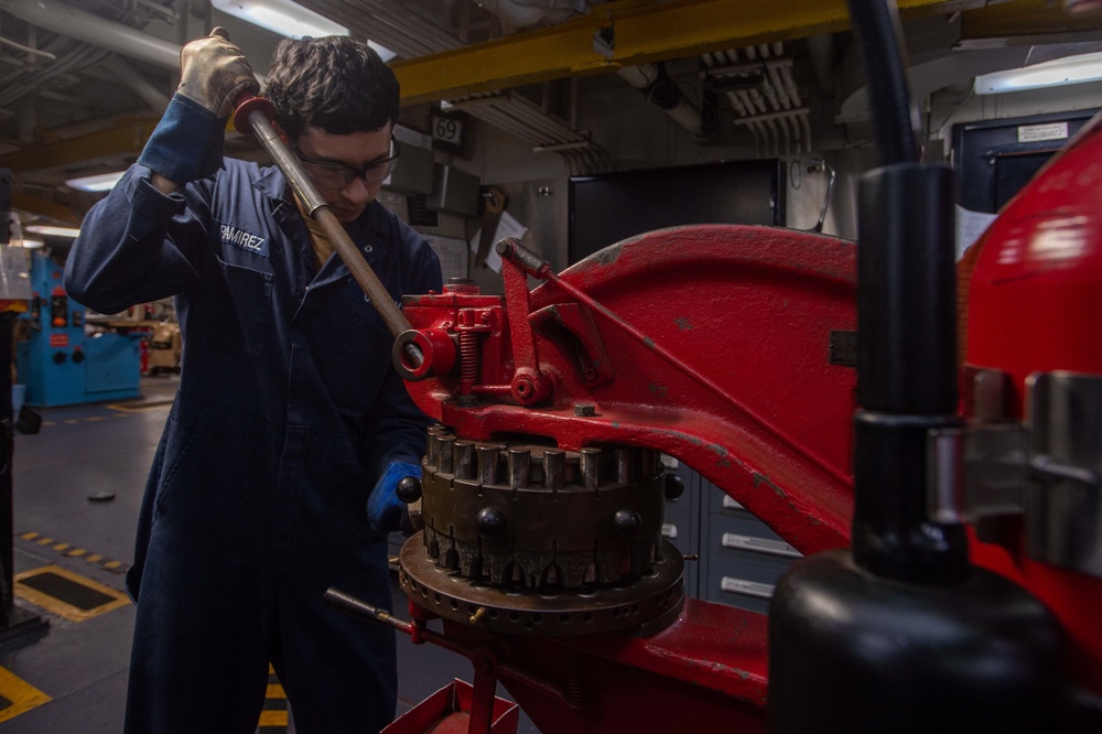 USS Ronald Reagan (CVN 76) Sailors conduct machinery repairs