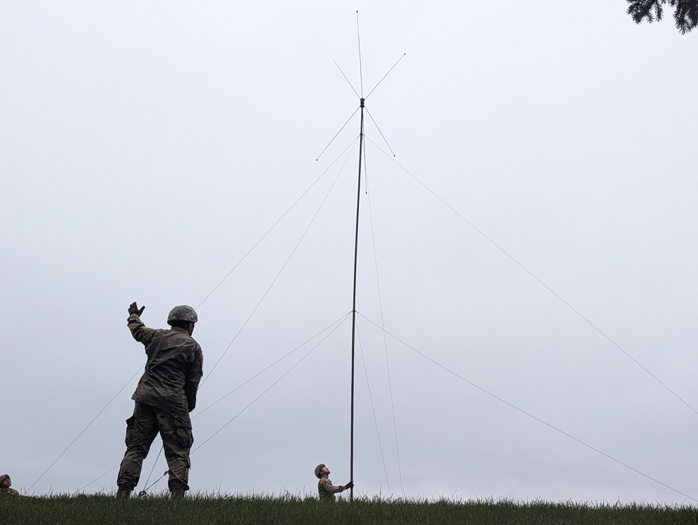 Communications Soldiers Assemble Antenna