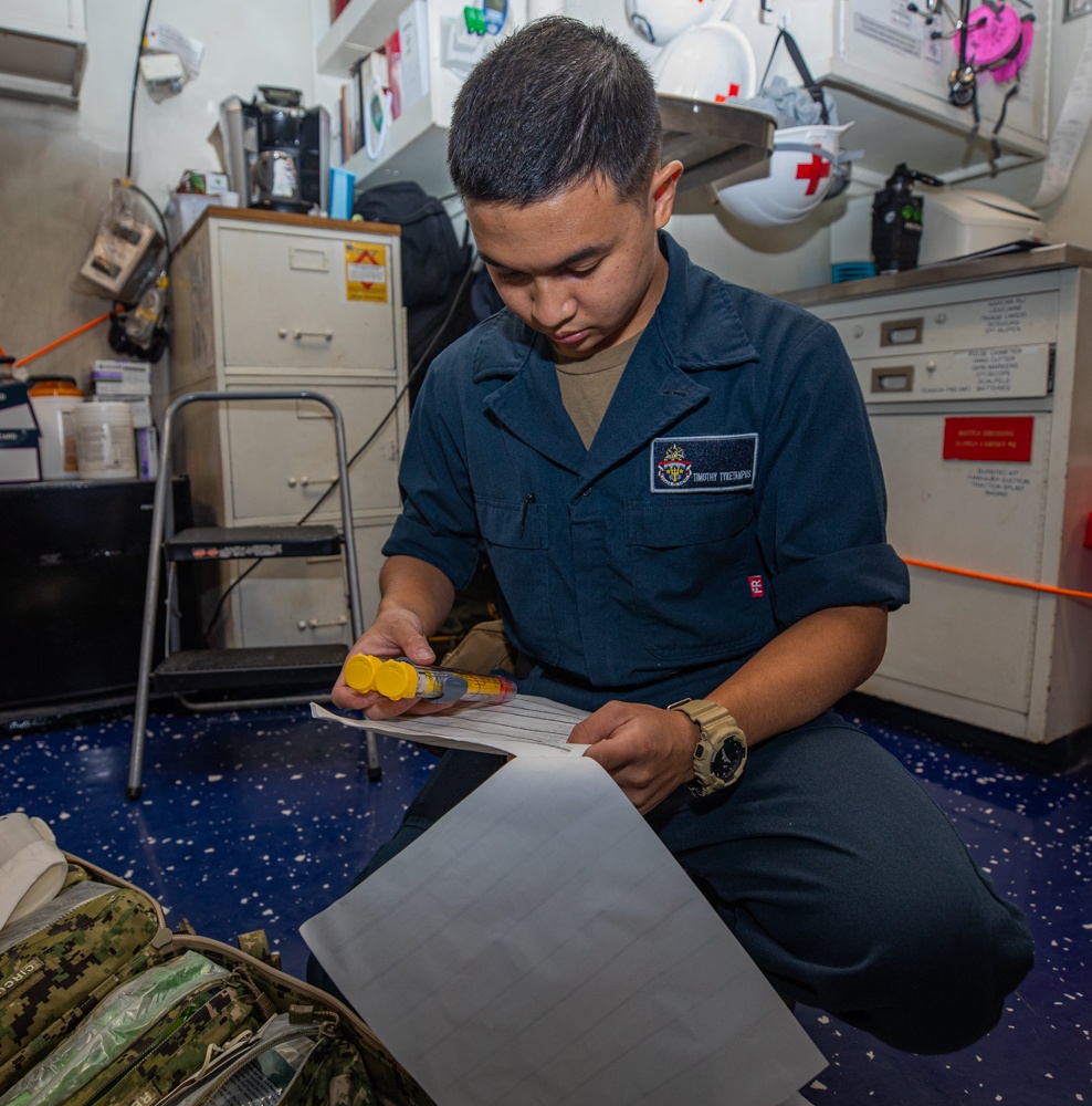 USS Antietam (CG 54) Corpsman Conducts Inventory