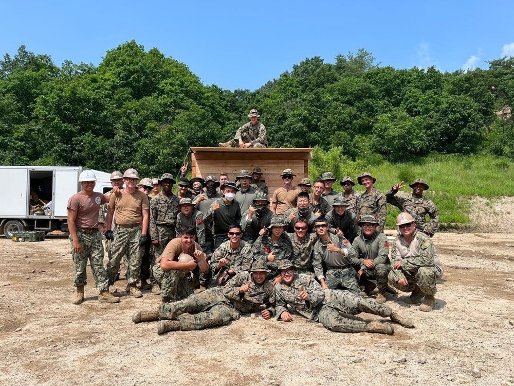 Naval Mobile Construction Battalion 4 Korean Military Exchange Program Exercise group photo.