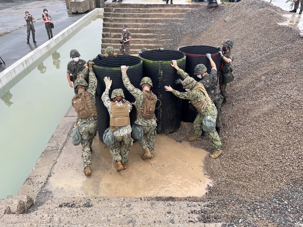 Naval Mobile Construction Battalion 4, begin pier damage repair during joint exercise Ulchi Freedom Shield.