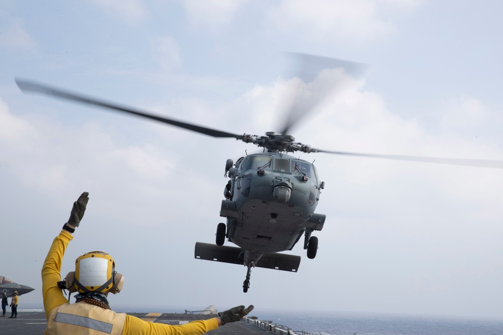 USS Tripoli Co Flies with HSC 23.