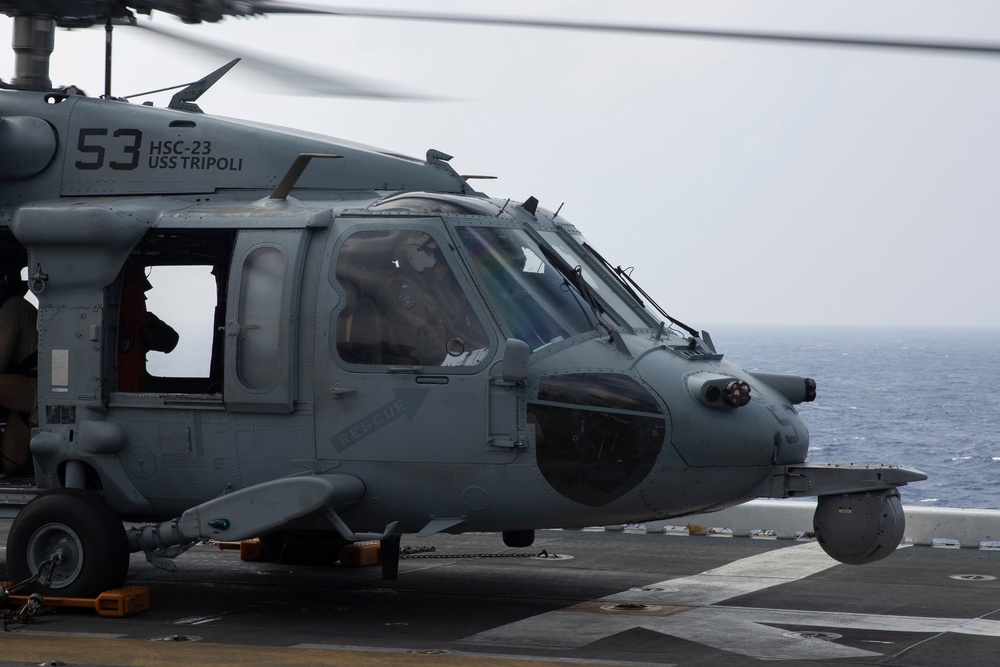 USS Tripoli Co Flies with HSC 23.