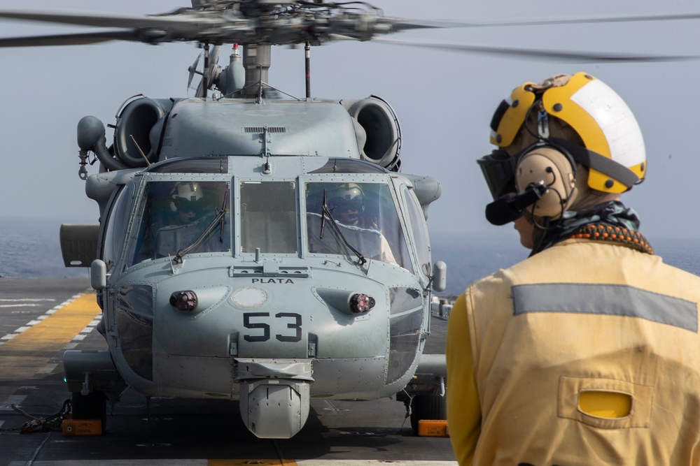 USS Tripoli Co Flies with HSC 23.