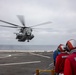 CH-53E Super Stallion conduct a resupply at sea on the Anchorage