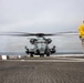 CH-53E Super Stallion conduct a resupply at sea on the Anchorage