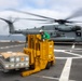 CH-53E Super Stallion conduct a resupply at sea on the Anchorage