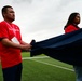Airmen support San Francisco 49ers’ pre-game flag unfurling