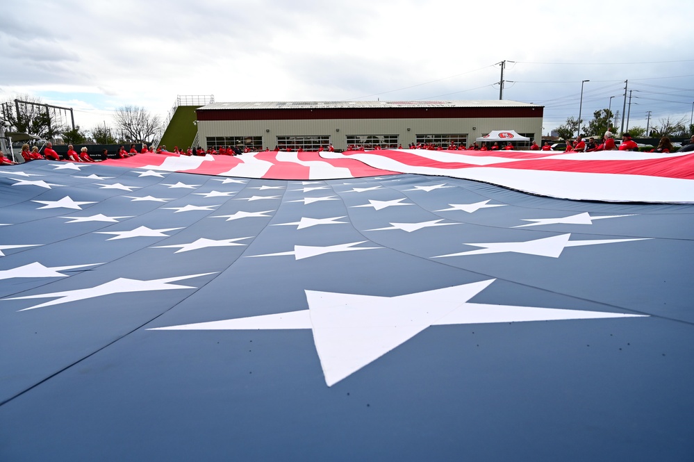 Airmen support San Francisco 49ers’ pre-game flag unfurling