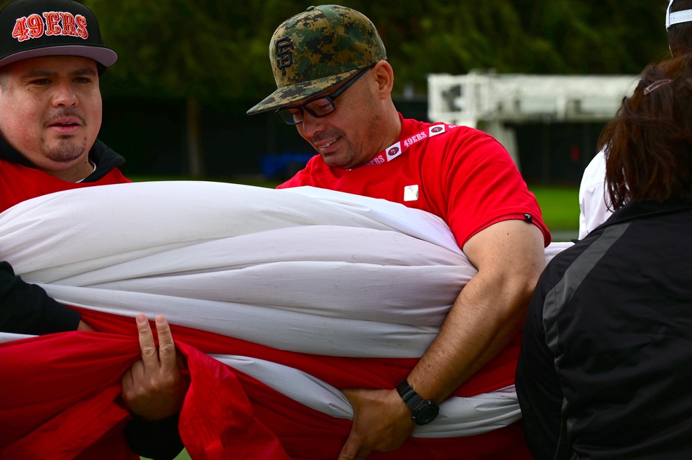 Airmen support San Francisco 49ers’ pre-game flag unfurling