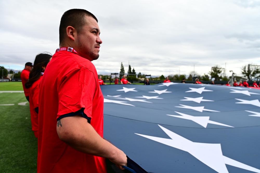 Airmen support San Francisco 49ers’ pre-game flag unfurling