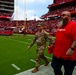 Airmen support San Francisco 49ers’ pre-game flag unfurling