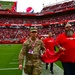 Airmen support San Francisco 49ers’ pre-game flag unfurling