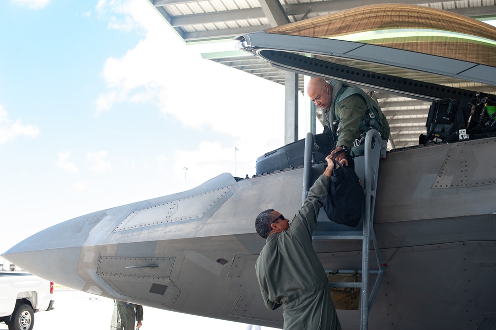 Symbolic F-22 flight marks 154th Wing change of command