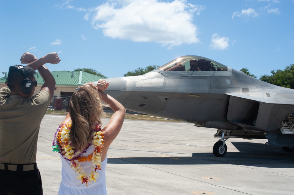 Symbolic F-22 flight marks 154th Wing change of command