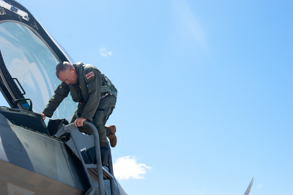 Symbolic F-22 flight marks 154th Wing change of command
