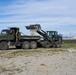 Naval Mobile Construction Battalion 4 removes debris from fence lines.