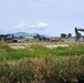 Naval Mobile Construction Battalion 4 conduct grading and leveling operations.