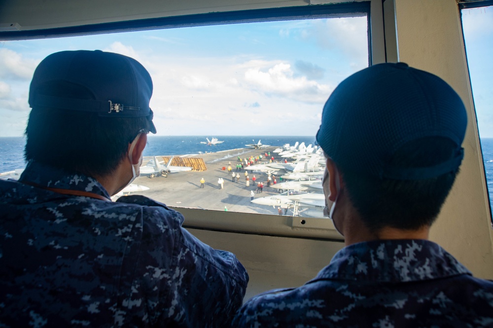 USS Ronald Reagan (CVN 76) and JS Amagiri (DD 154) conduct joint operations