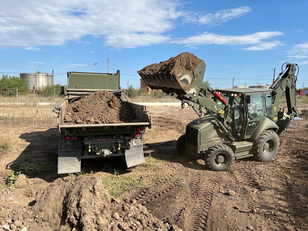 Seabees Load Truck with loose soil