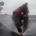 Sailor Clears Flight Deck Nozzle