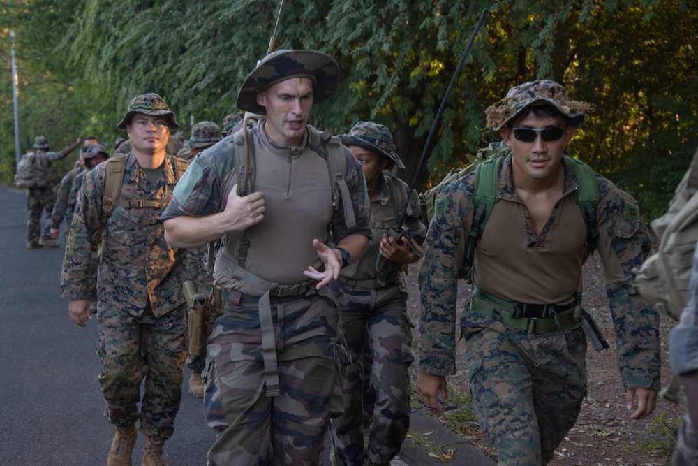 U.S. Marines and French Armed Forces conduct 30km hike