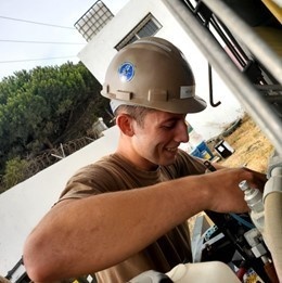 NMCB-11 Seabees repair a CAT Roller