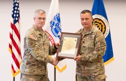 Lt. Col. Trond Ruud and Col. Scott Madore Pose with Product Manager Small Arms Fire Control Organizational Charter