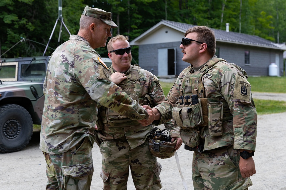 102nd Infantry Regiment soldiers receive awards, conduct reflexive fire drills, machine gun qualification during Annual Training