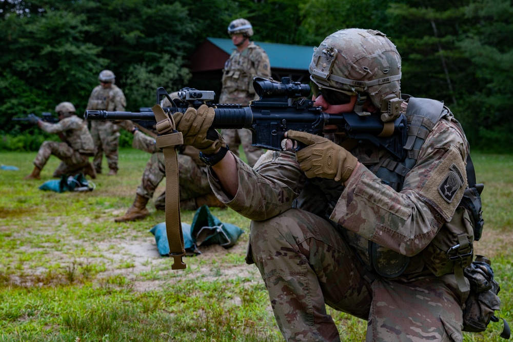 102nd Infantry Regiment soldiers receive awards, conduct reflexive fire drills, machine gun qualification during Annual Training