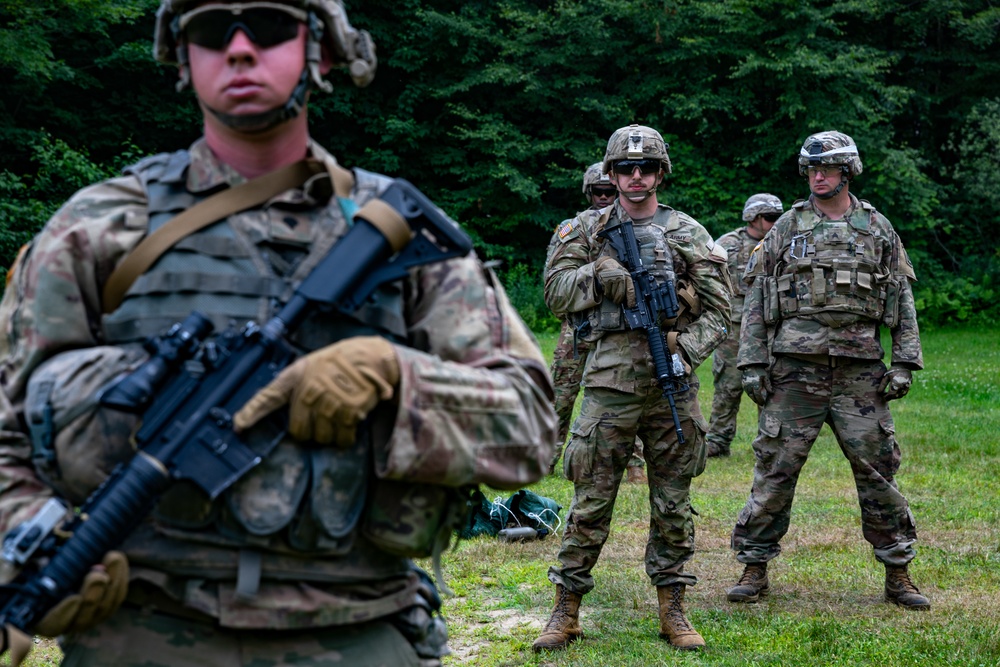 102nd Infantry Regiment soldiers receive awards, conduct reflexive fire drills, machine gun qualification during Annual Training