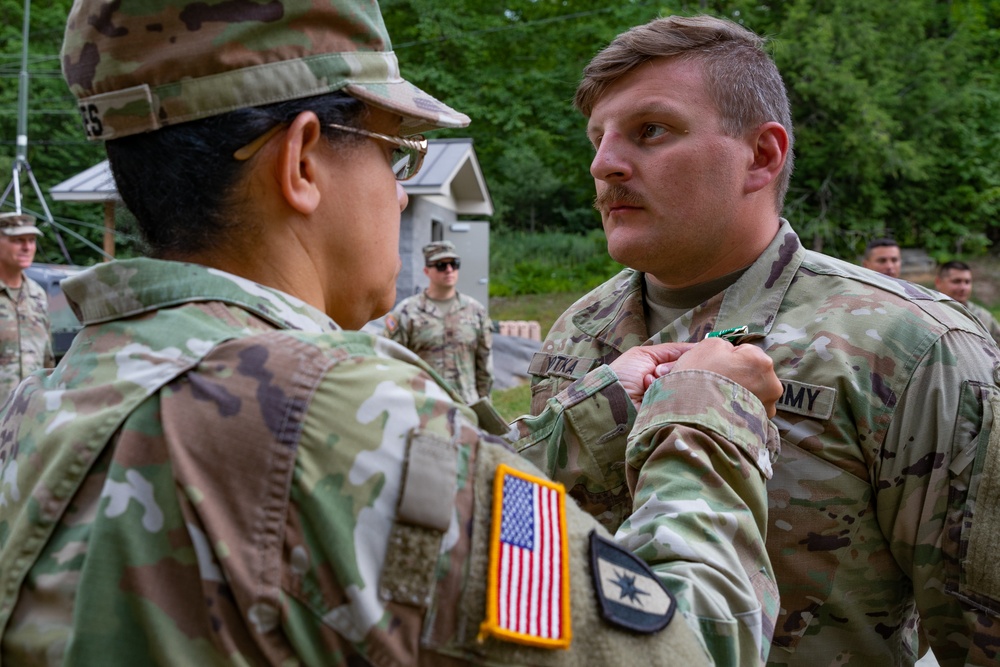 102nd Infantry Regiment soldiers receive awards, conduct reflexive fire drills, machine gun qualification during Annual Training