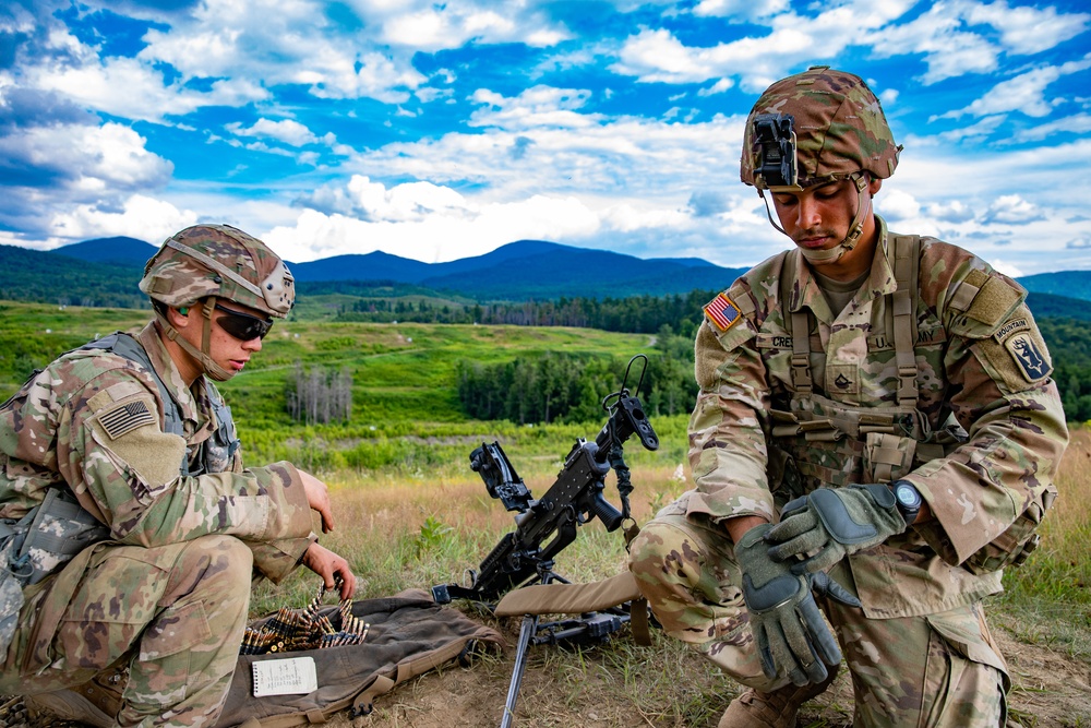 102nd Infantry Regiment soldiers receive awards, conduct reflexive fire drills, machine gun qualification during Annual Training