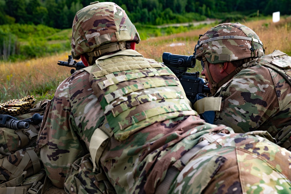 102nd Infantry Regiment soldiers receive awards, conduct reflexive fire drills, machine gun qualification during Annual Training