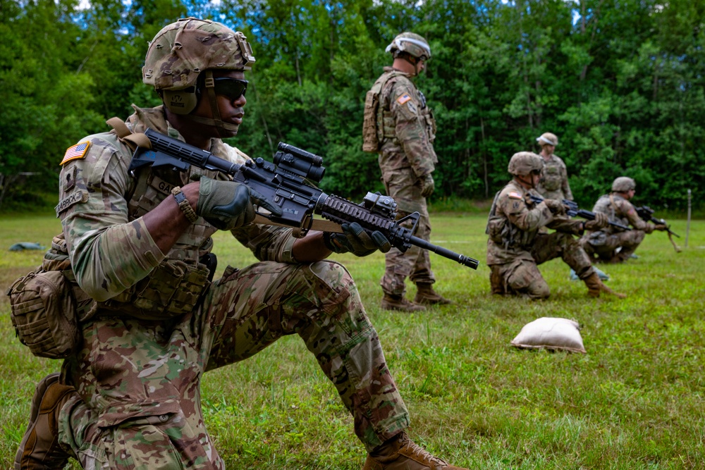 102nd Infantry Regiment soldiers receive awards, conduct reflexive fire drills, machine gun qualification during Annual Training