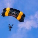 The U.S. Army Parachute Team jumps onto the USS Midway in San Diego