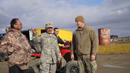 Maj. Gen. Torrence Saxe identifies storm damage with Alaska State Defense Force in Scammon Bay