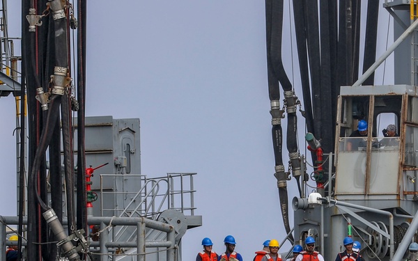 USS Higgins Conducts RAS With USNS Big Horn