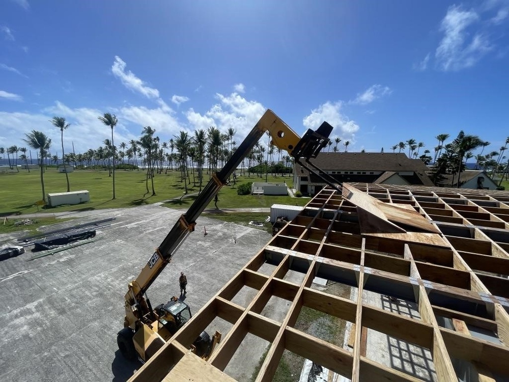 Seabees with Naval Mobile Construction Battalion 4 work with Marshallese contractors for the Richardson Multipurpose Facility project.