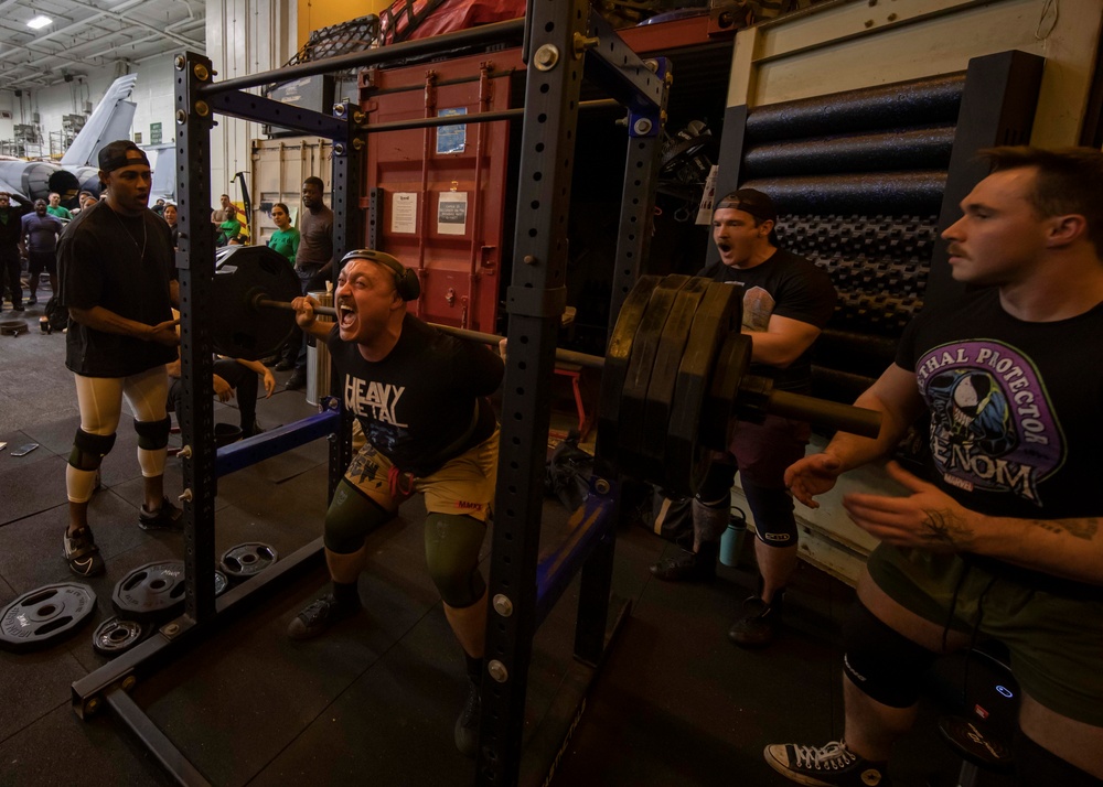 US Navy Sailors Participate in a Squat Challenge Aboard USS George H.W. Bush