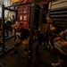 US Navy Sailors Participate in a Squat Challenge Aboard USS George H.W. Bush