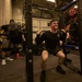 US Navy Sailors Participate in a Squat Challenge Aboard USS George H.W. Bush