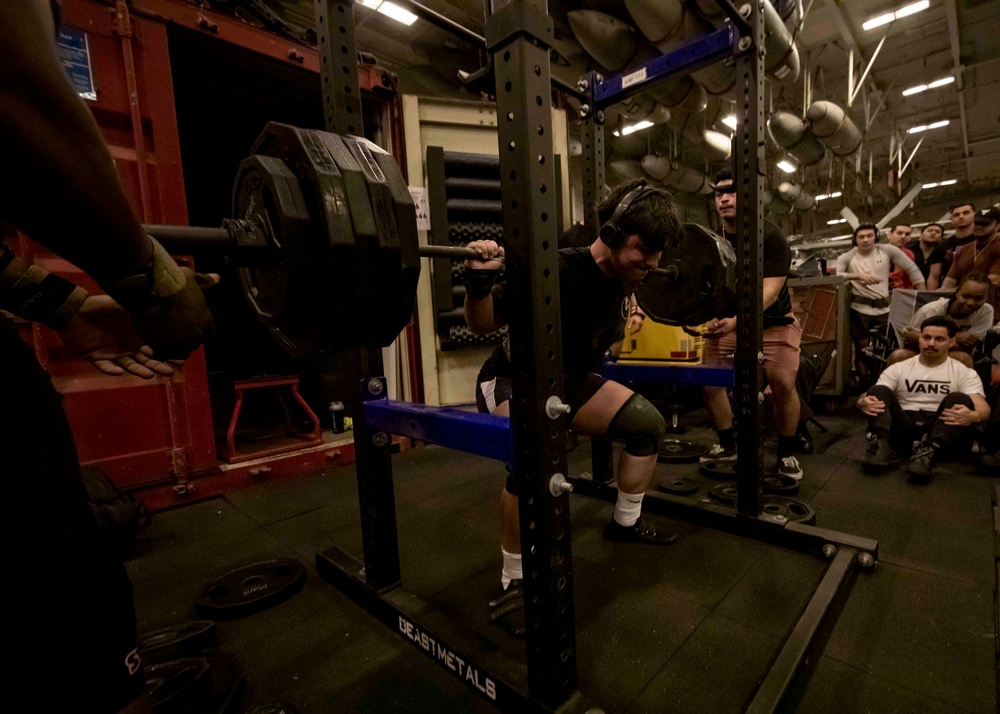 US Navy Sailors Participate in a Squat Challenge Aboard USS George H.W. Bush